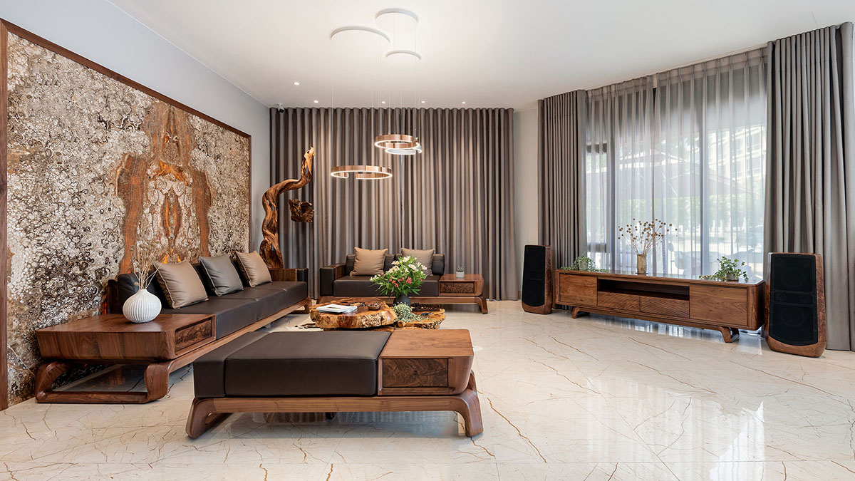 Thiết kế nội thất phòng khách nhà cấp 4 Sofa gỗ Óc chó màu nâu trầm phù hợp với nội thất chung phòng khách